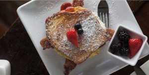 feed_cafe_3_french_toast_breakfast_sandwich_with_bacon_and_eggs021516jpg